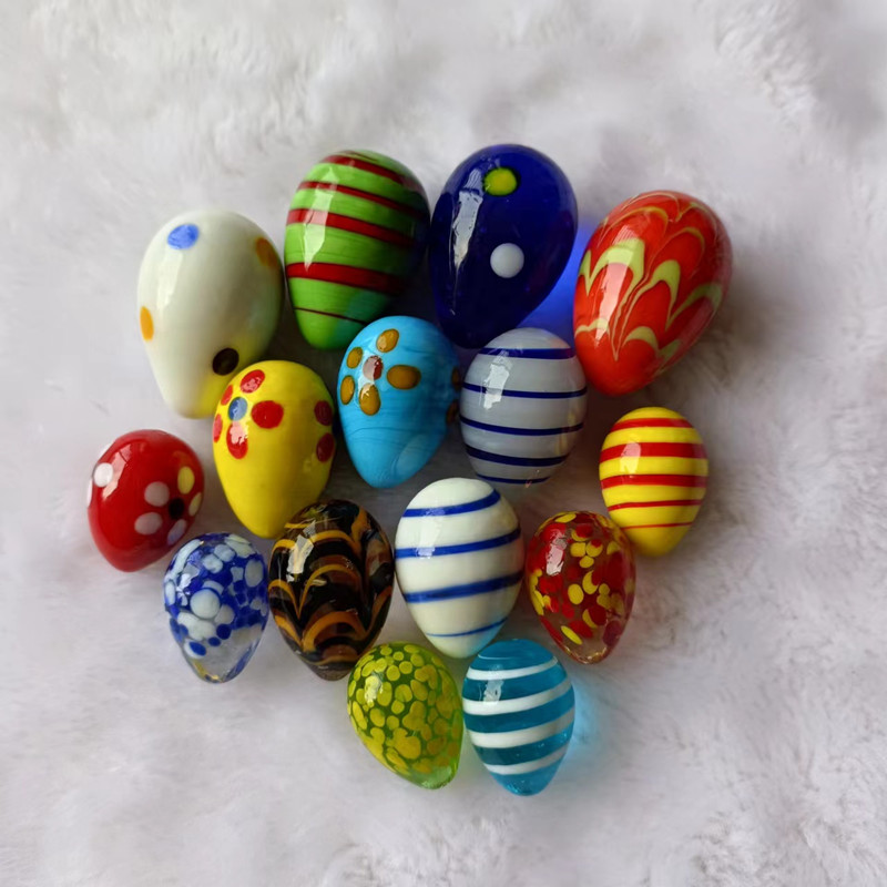 Monochrome glass marble supplier 14mm 16mm 25mm petal glass cat eye marbles